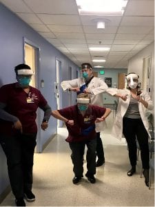 COVID measures in clinic. We are demonstrating social distancing and wearing our protective gear for the first time. We all did our best to keep patients and ourselves safe. In the first row left to right: Brandi, Terry and Dr. Liberman. In the back: Dr. Chaon